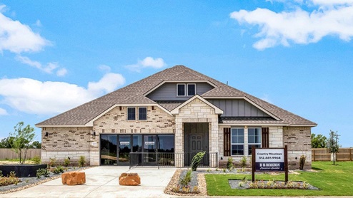 Country Meadows model home exterior elevation with glass store front windows.