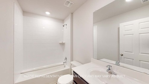 Ashburn secondary bath with tub and shower combination.