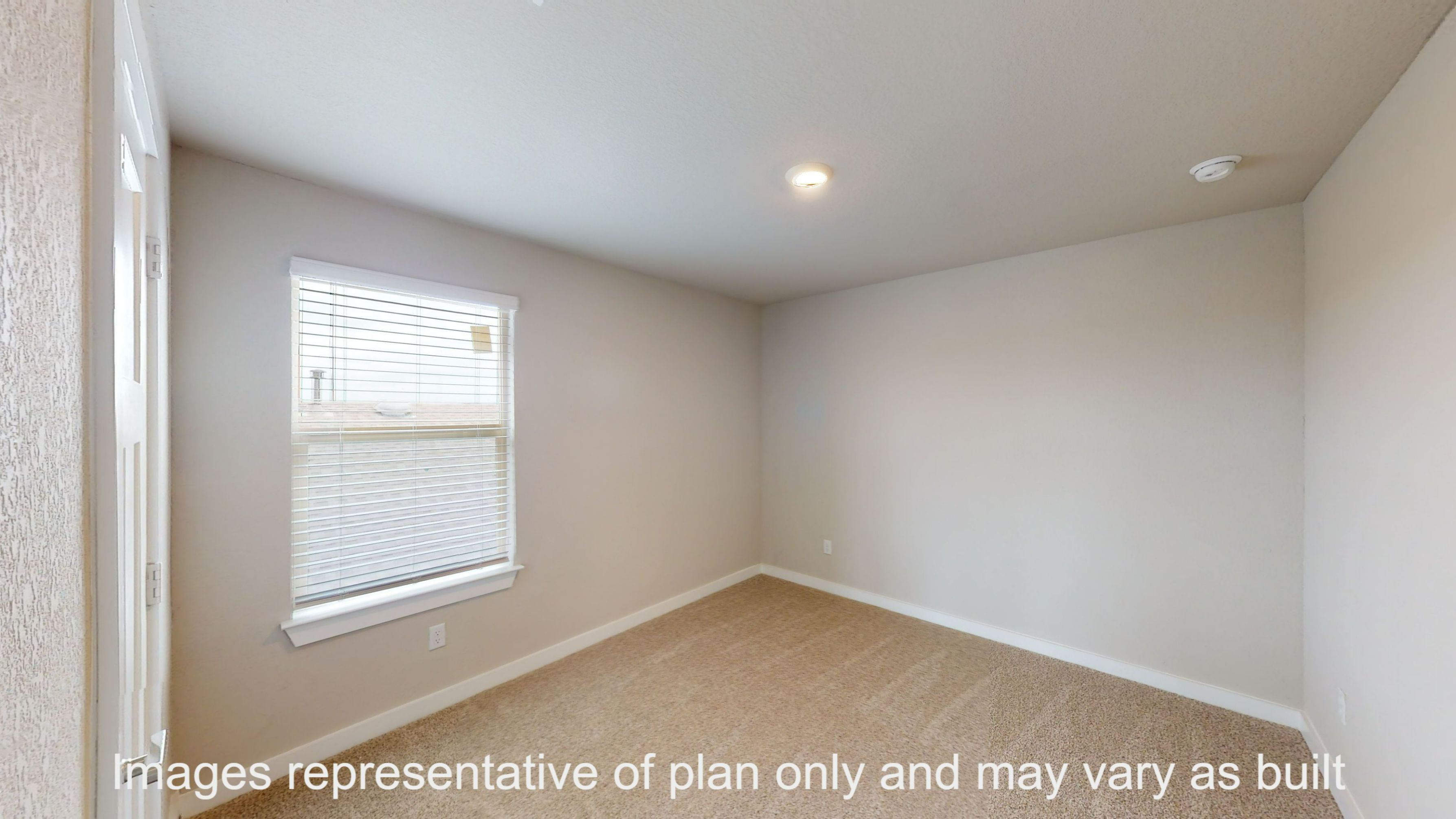 Florence secondary bedroom with carpet flooring and window.