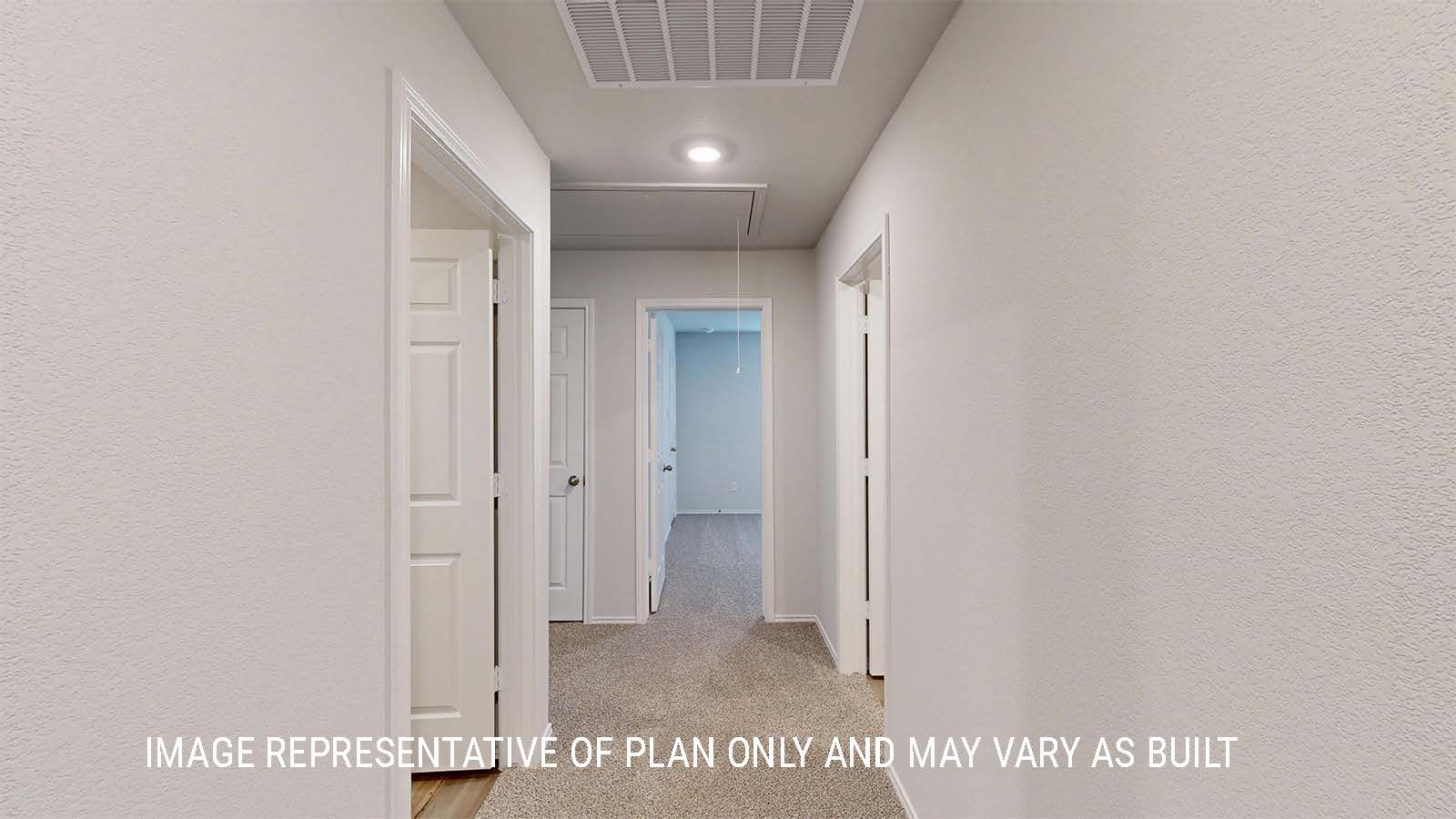 Grace hallway with carpeted flooring and view of secondary bedrooms.