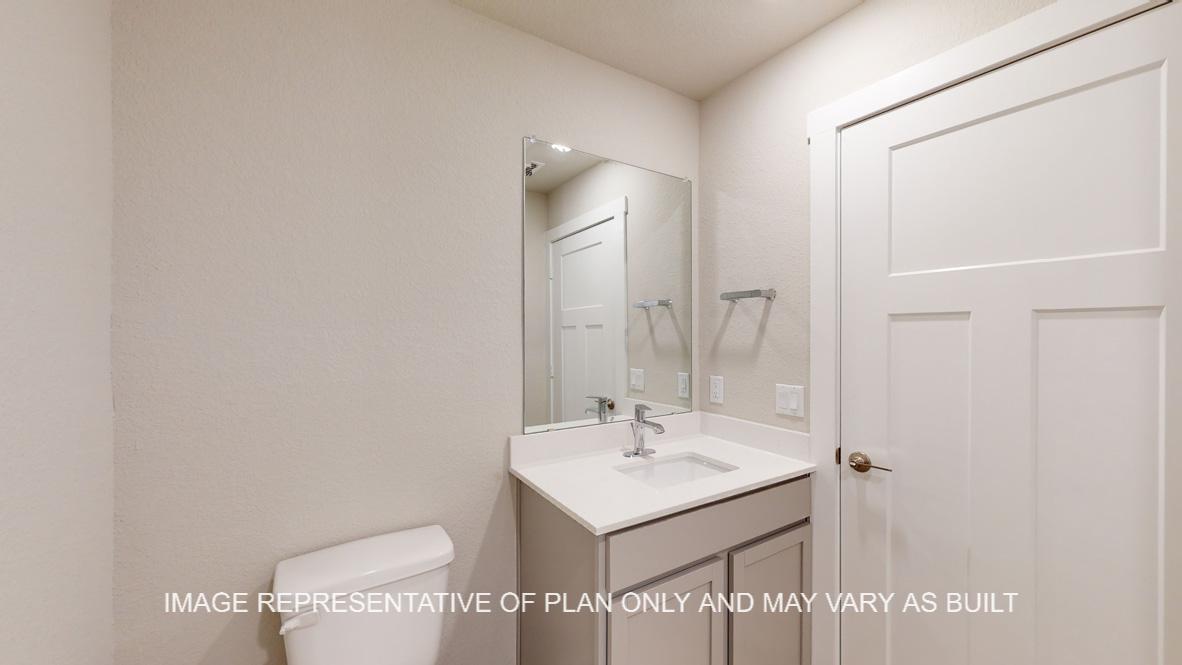 Easton powder bath with single sink and toilet.