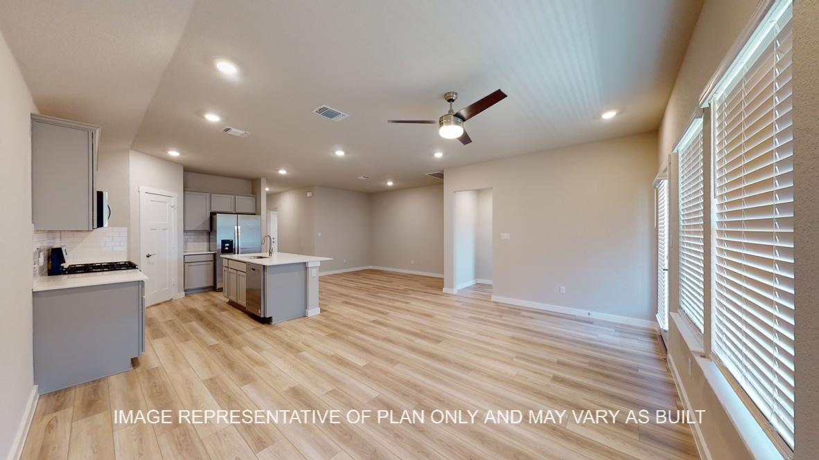 Easton living room with view to open concept kitchen and dining room.