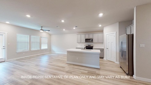 Easton living room with view to open concept kitchen and dining room.