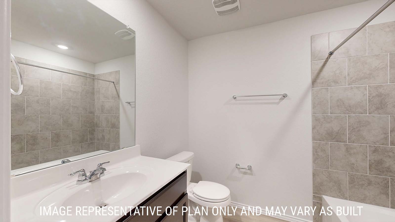 Gaven secondary bathroom with vanity sink and shower and tub combo.