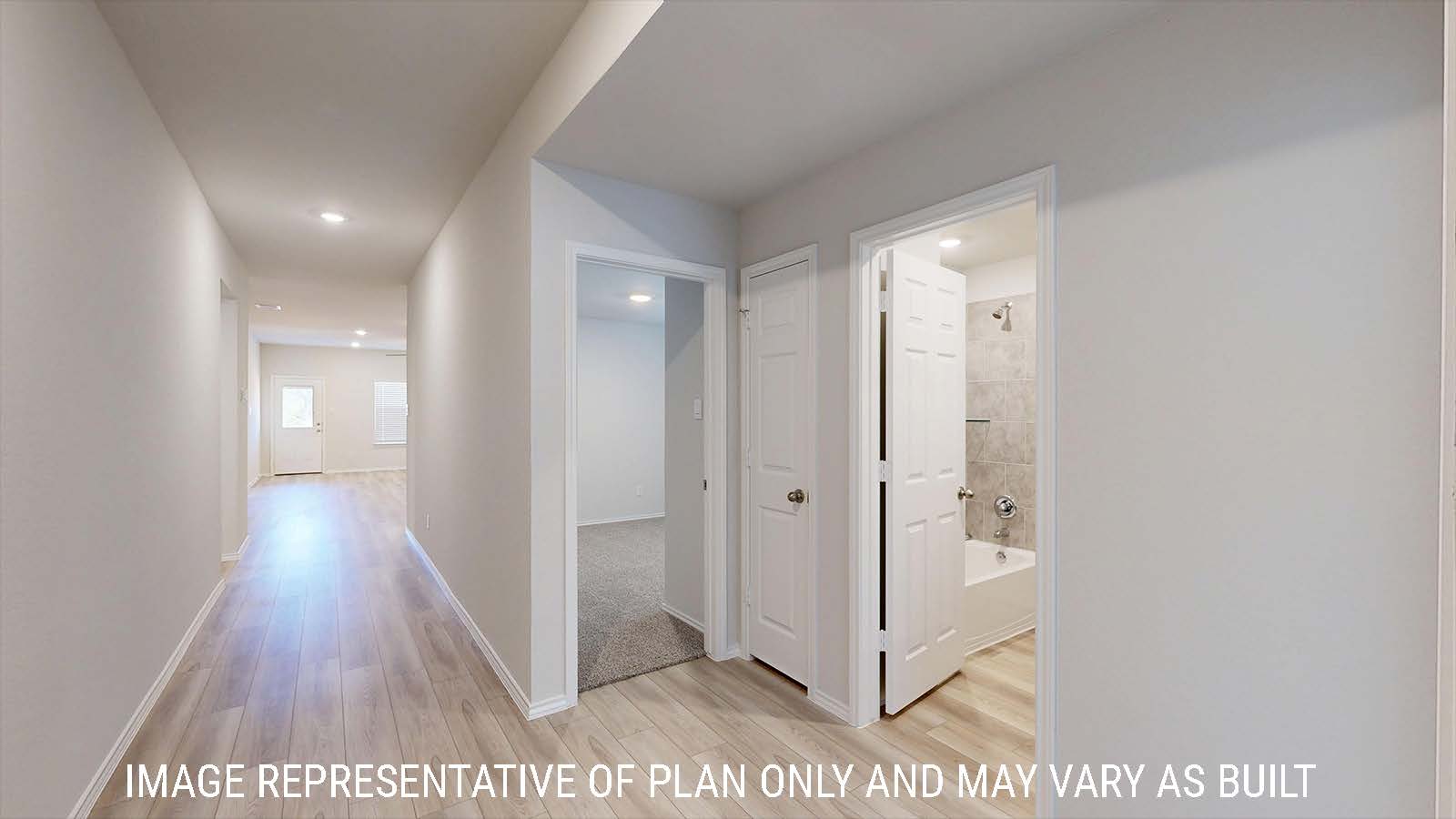 Harris front hallway with vinyl plank flooring and view of living room.