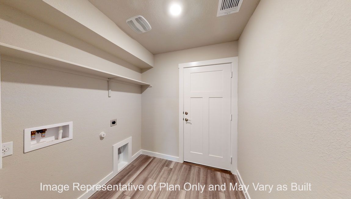 Harris utility room with vinyl plank flooring.
