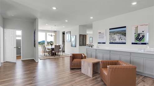 Turnbo Ranch Traditions model home front entry and lounge area.