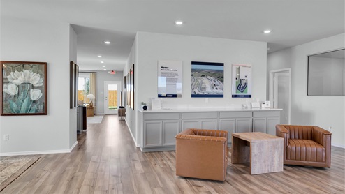 Turnbo Ranch Traditions model home front entry and lounge area.