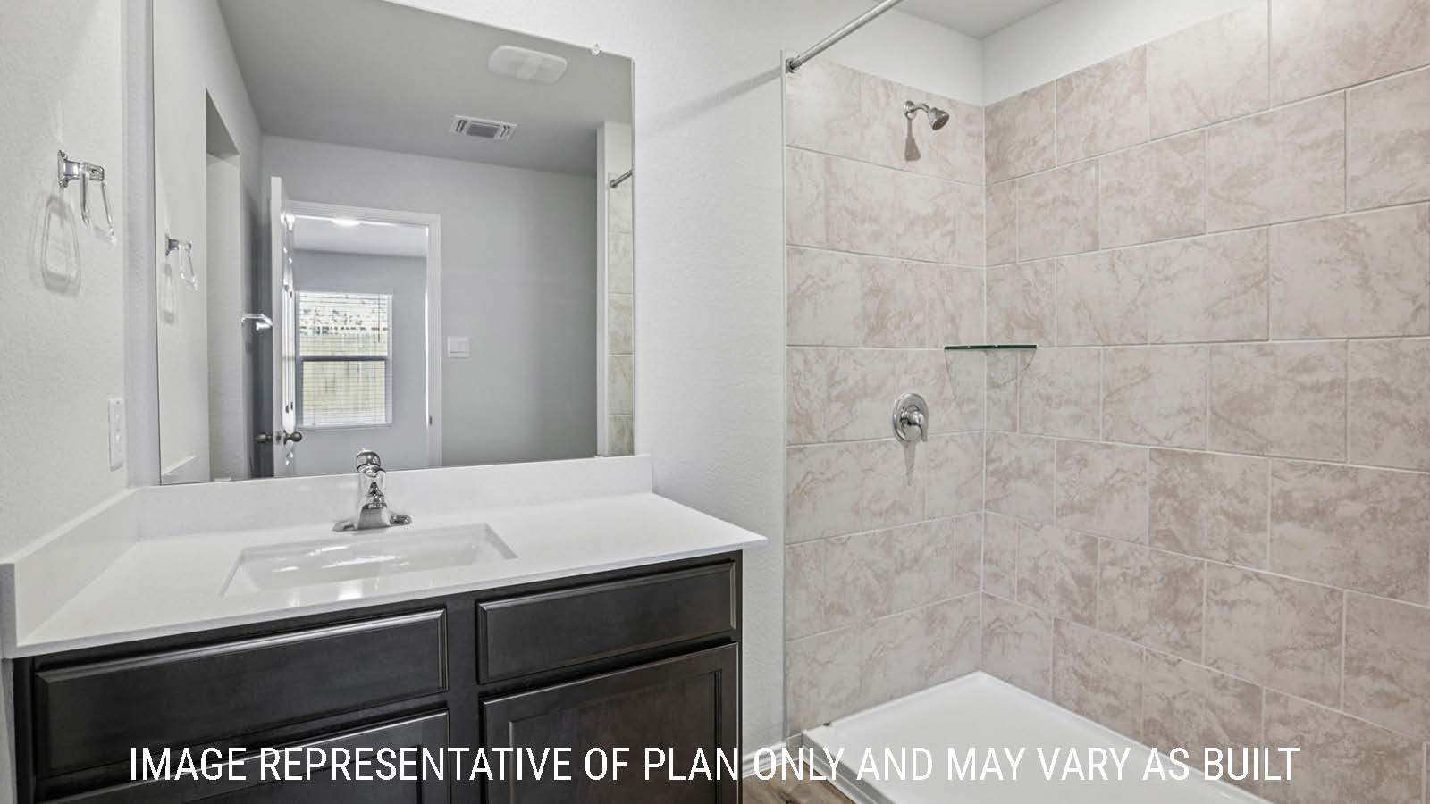 Caprock primary bathroom with vanity sink and walk-in shower.