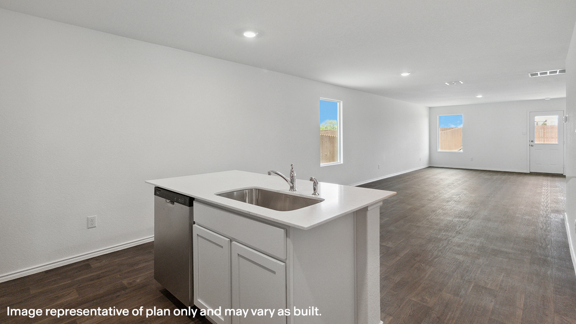 Caprock kitchen center kitchen island with view of dining room and living room.