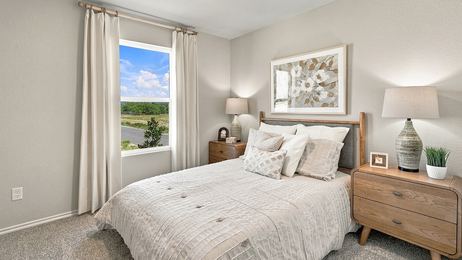 Pepper Creek Crossing model secondary bedroom with carpeted flooring and window for natural lighting.