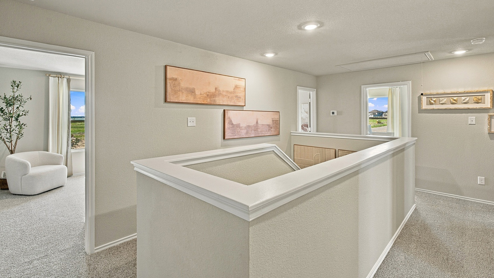 Pepper Creek Crossing model stairs to the second floor and view of secondary bedrooms.