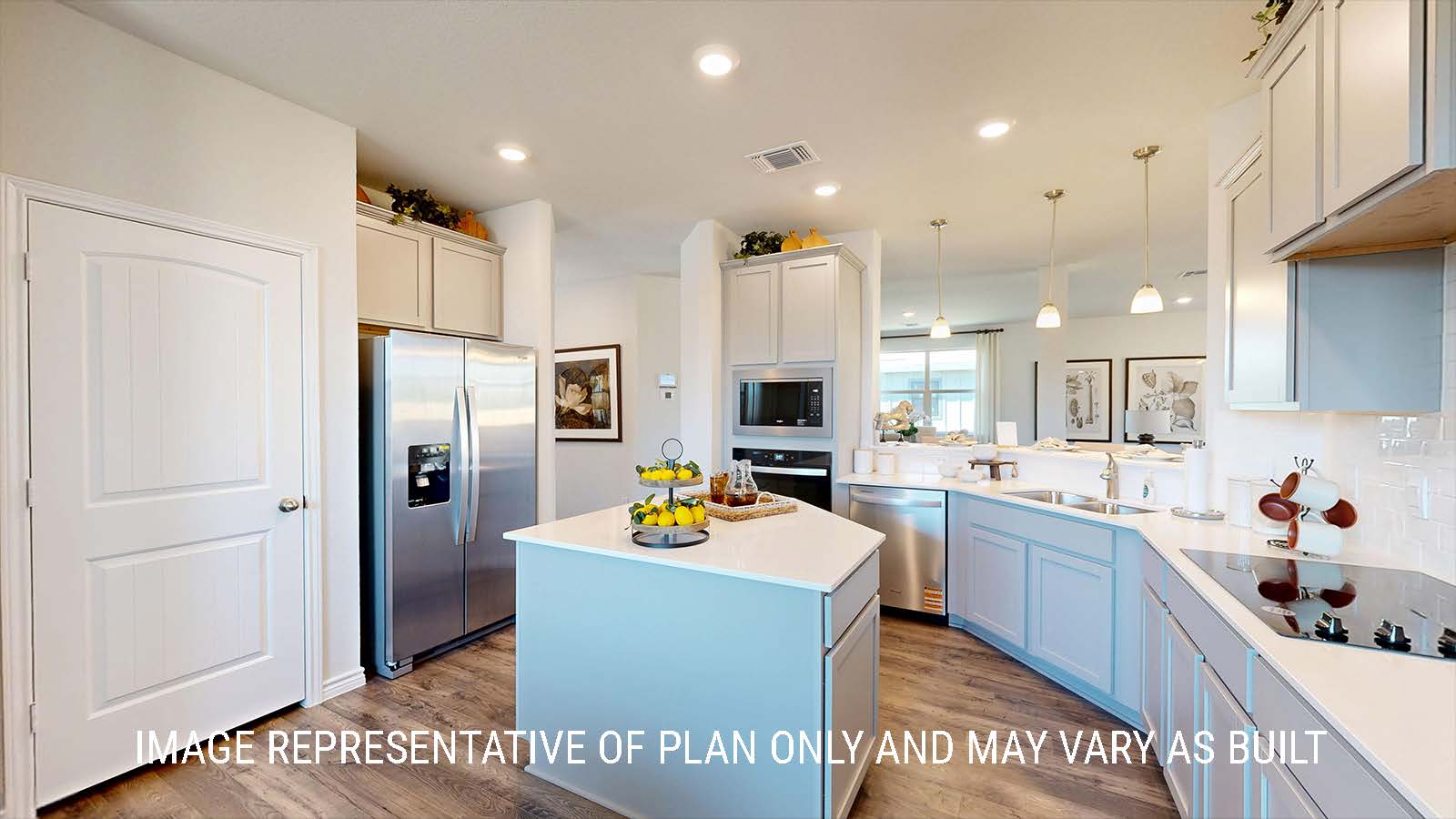 Newburgh kitchen with center kitchen island and light cabinets and granite countertops.