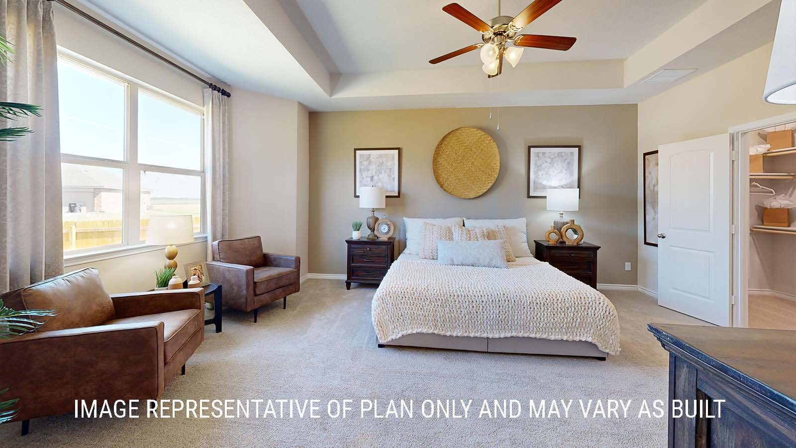 Newburgh primary bedroom with carpeted flooring and view of the primary walk-in closet.
