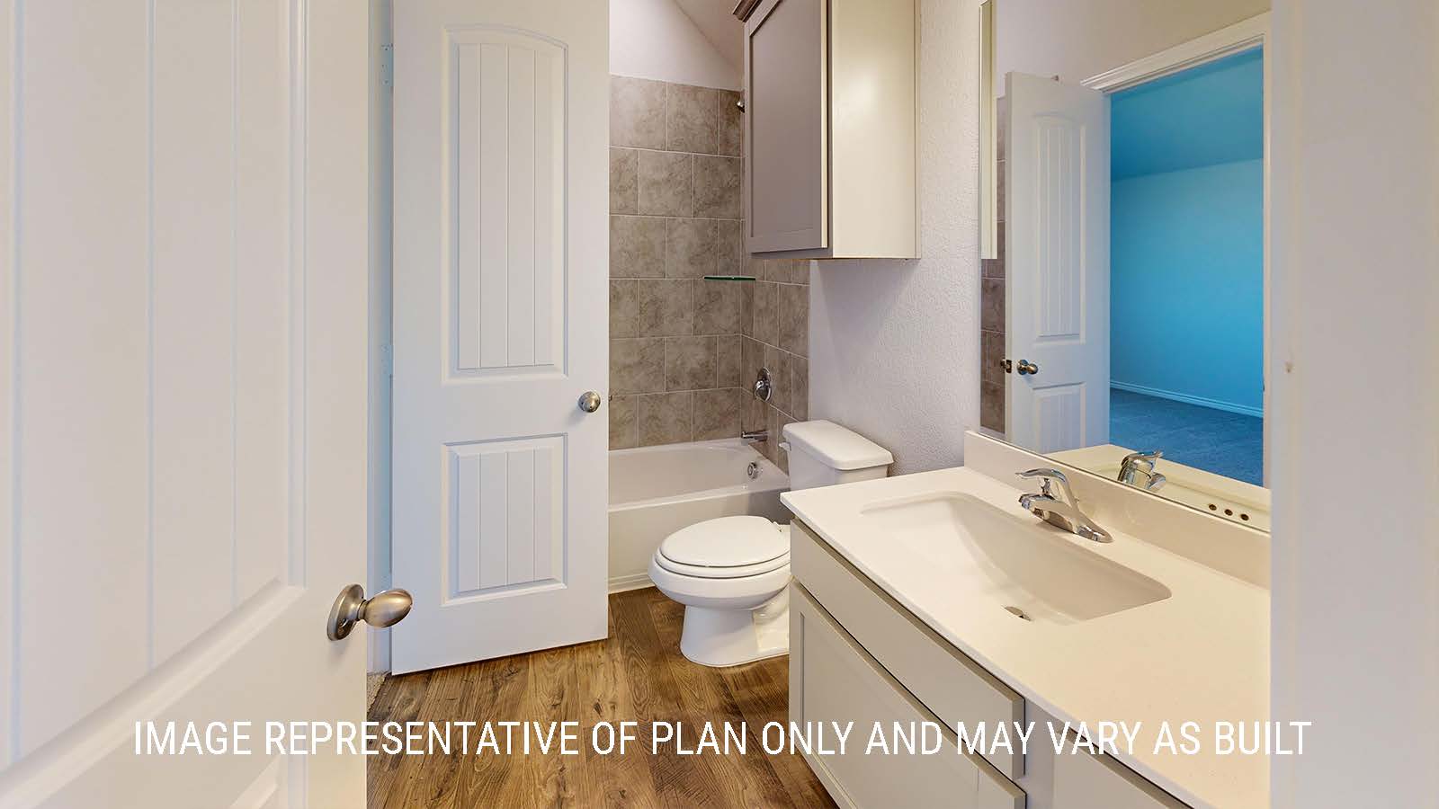 Newburgh secondary bathroom with single vanity sink and shower and tub combo.