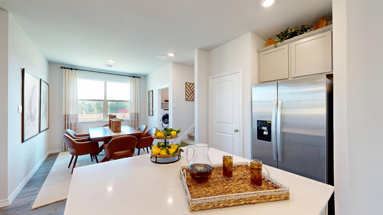 Newburgh kitchen with center kitchen island and view dining room.