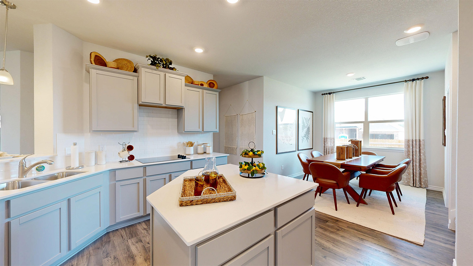 Newburgh kitchen with center kitchen island and view dining room.