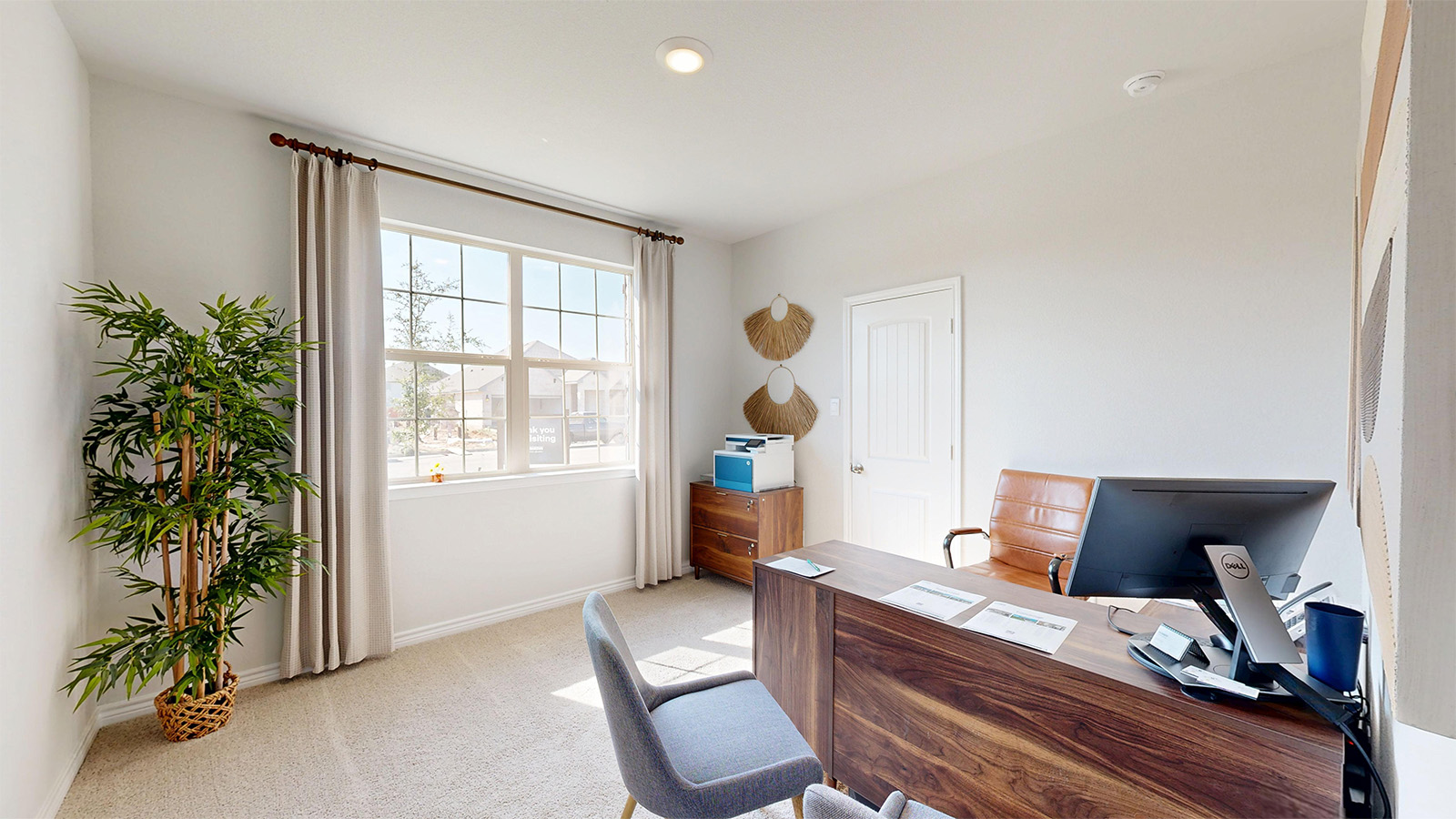 Newburgh office with carpeted flooring and windows for lighting.