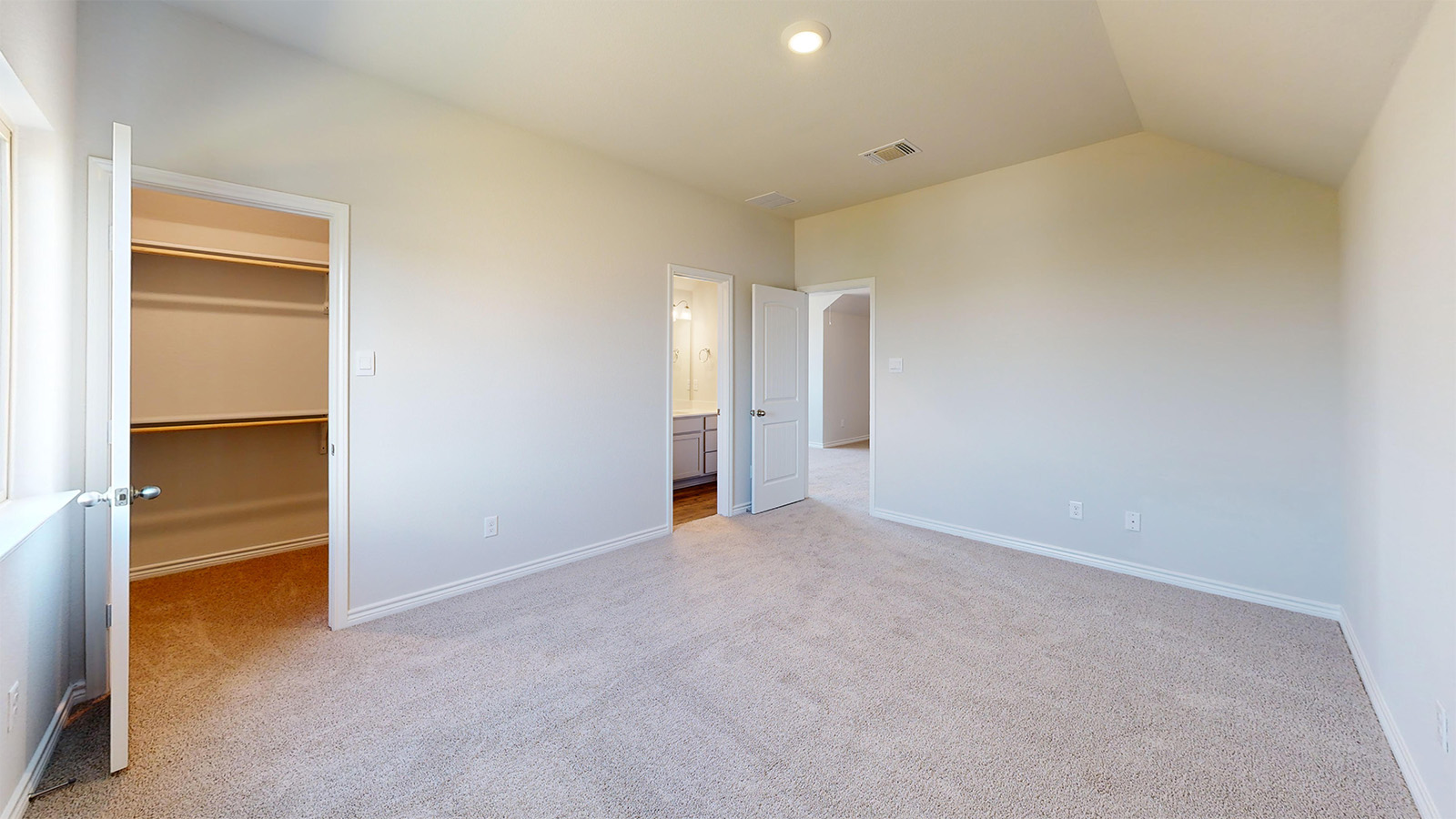 Newburgh secondary bedroom with carpeted flooring and closet.