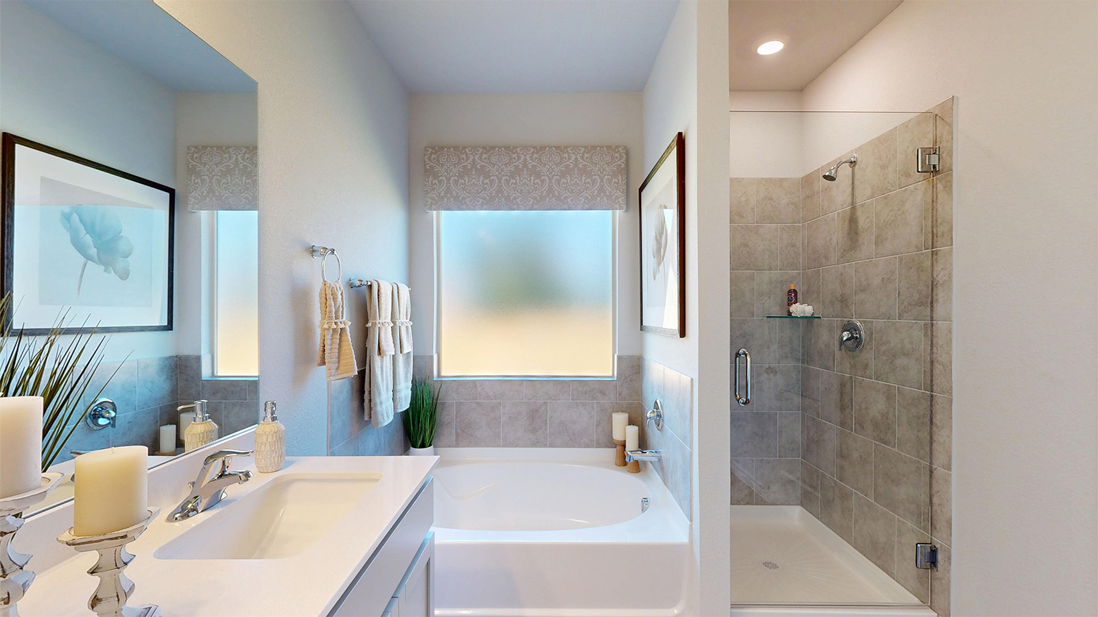 Newburgh primary bathroom with garden tub and walk-in shower.