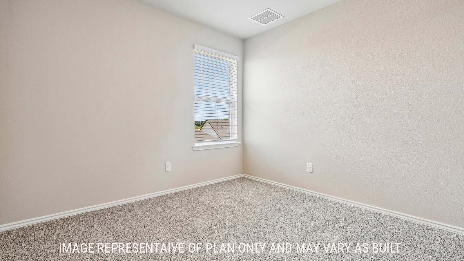 Prosper secondary bedroom with carpeted flooring and windows for natural lighting.