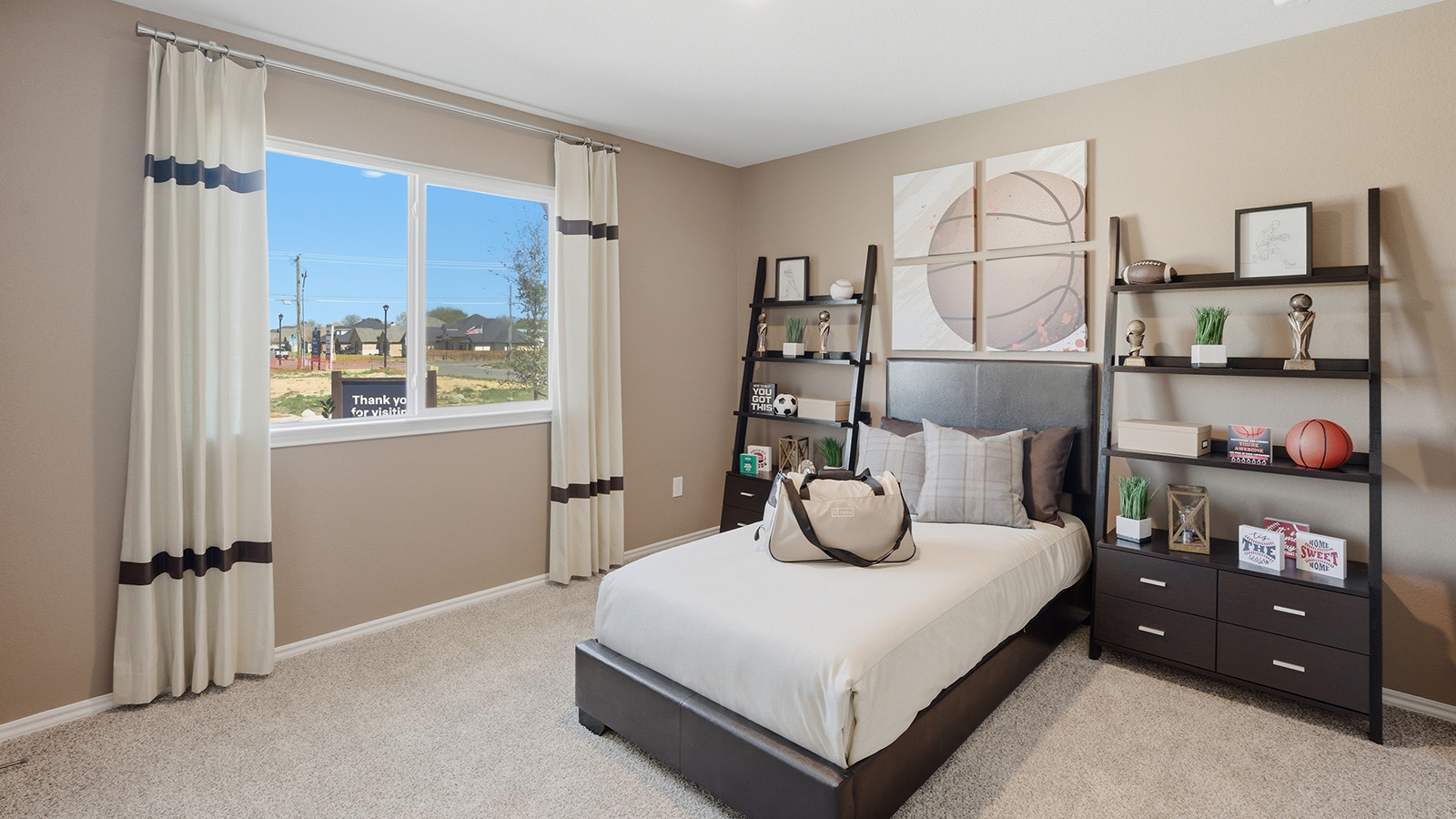 Eagles Landing Model Home secondary bedroom with carpeted flooring and window for lighting.