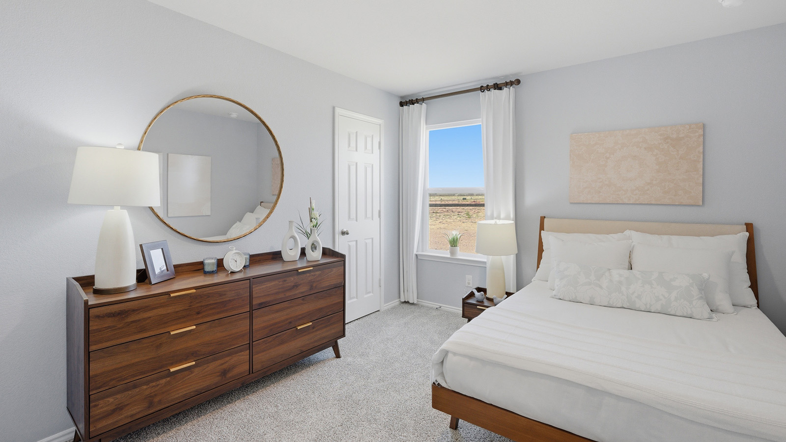 Eagles Landing Model Home secondary bedroom with carpeted flooring and window for lighting.