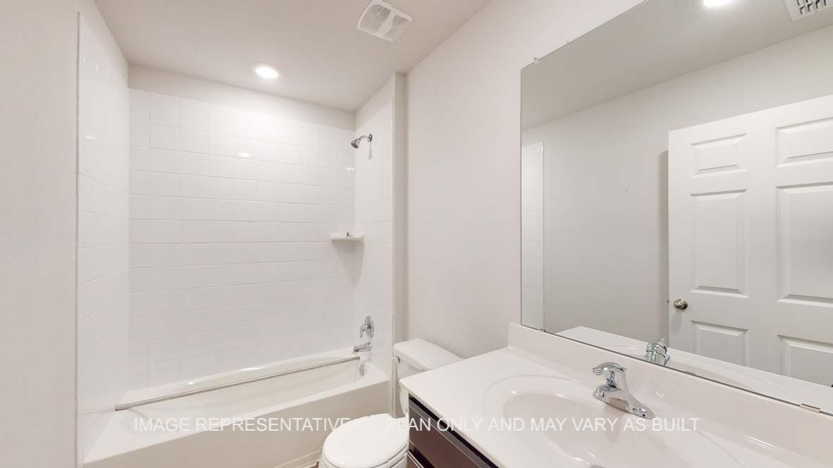 Ashburn secondary bath with tub and shower combination.