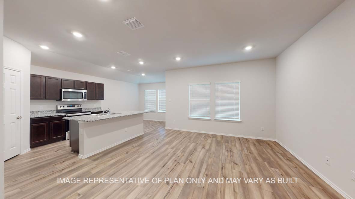 Ashburn entry with view into open concept living area and kitchen.
