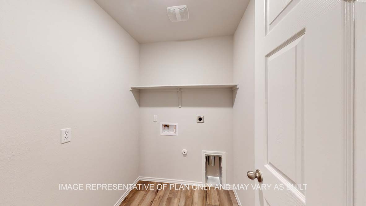 Ashburn utility room with vinyl plank flooring.