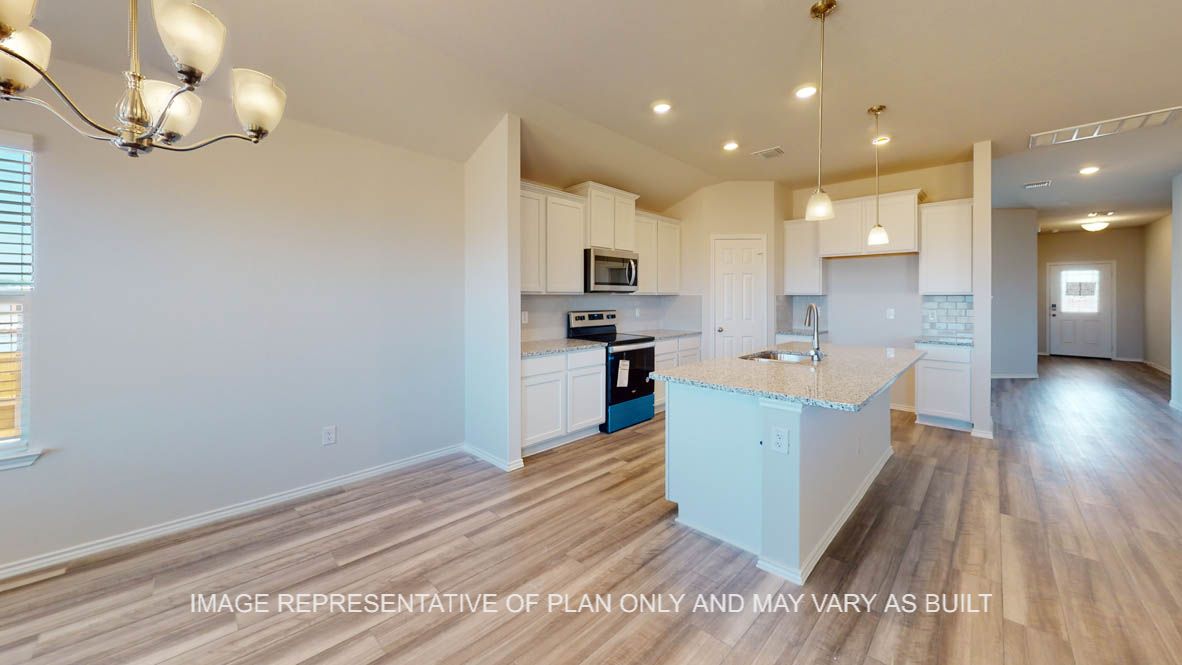 Prescott kitchen center island with granite countertops and undermount sink.