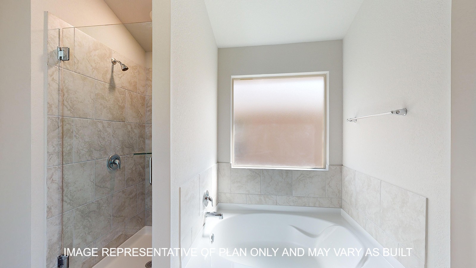 Monroe primary bathroom with separate tub and shower and ceramic tile surround.