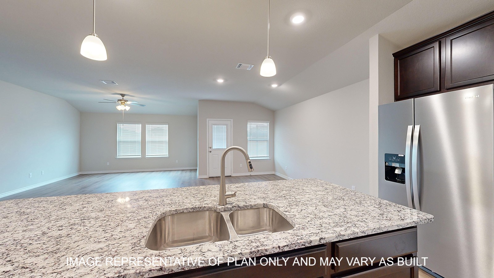 Monroe kitchen with center kitchen island and undermount sink.