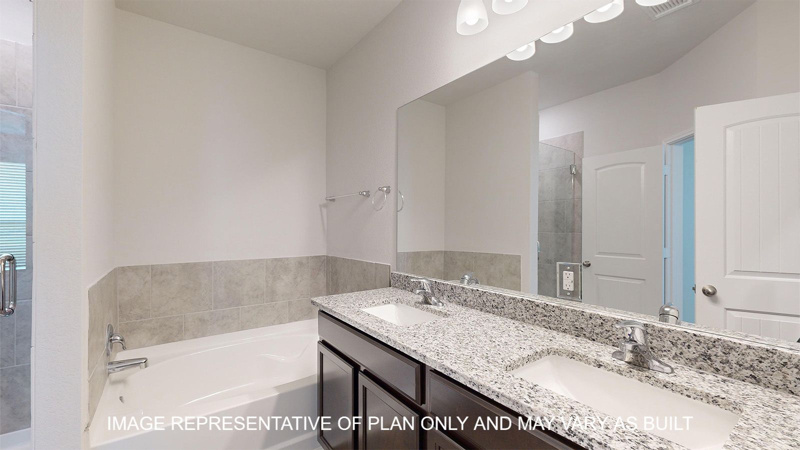 Sterling primary bath with garden tun and dual vanities.