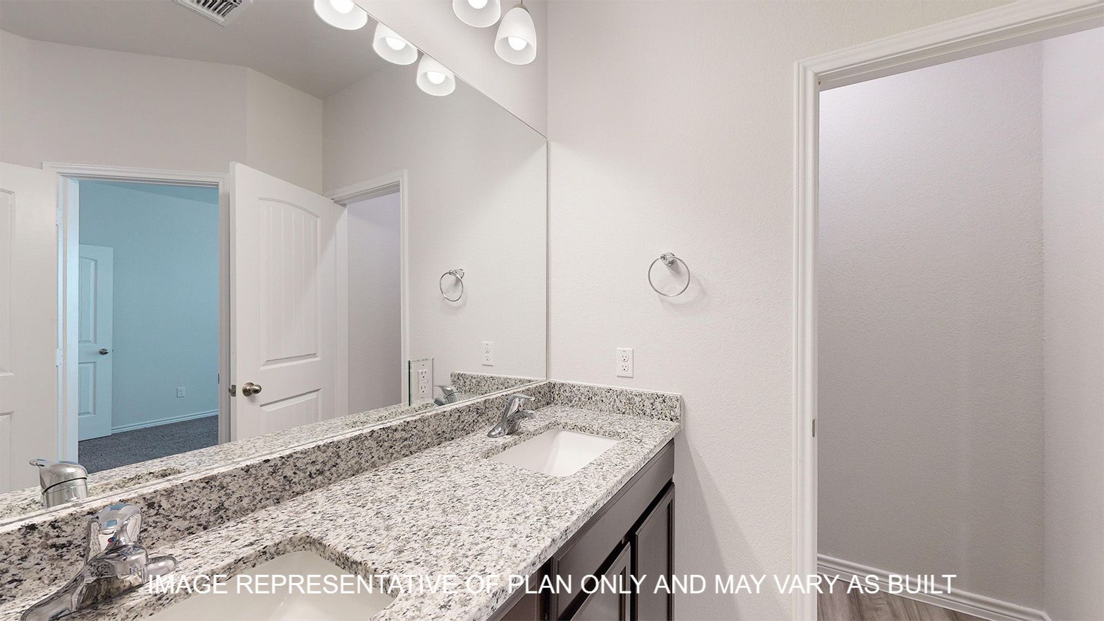 Sterling secondary bedroom with carpet flooring.