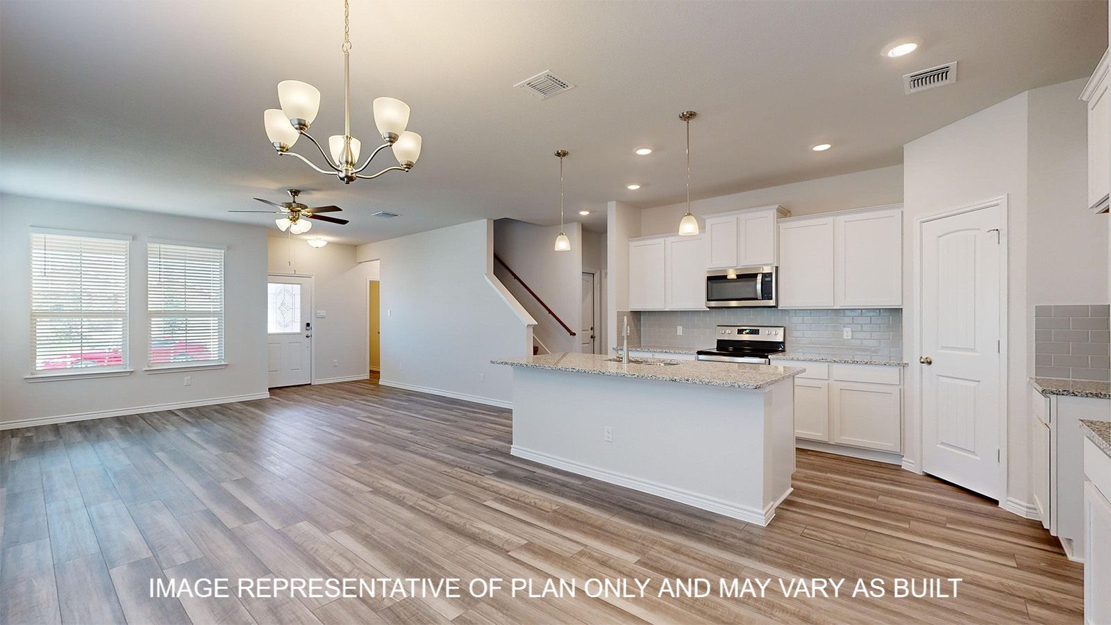 Sterling kitchen with large center kitchen island with undermount sink.