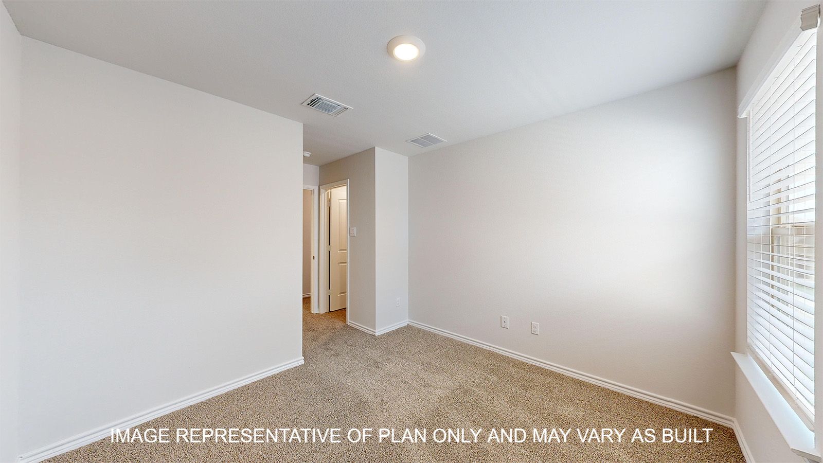 Sterling secondary bedroom with carpet flooring and window.