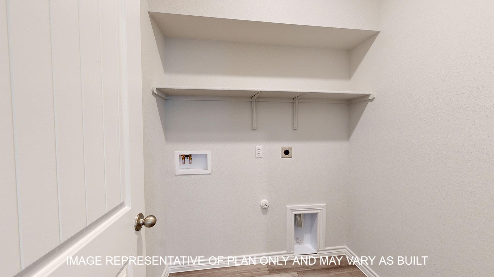 Sterling utility room with storage shelves.