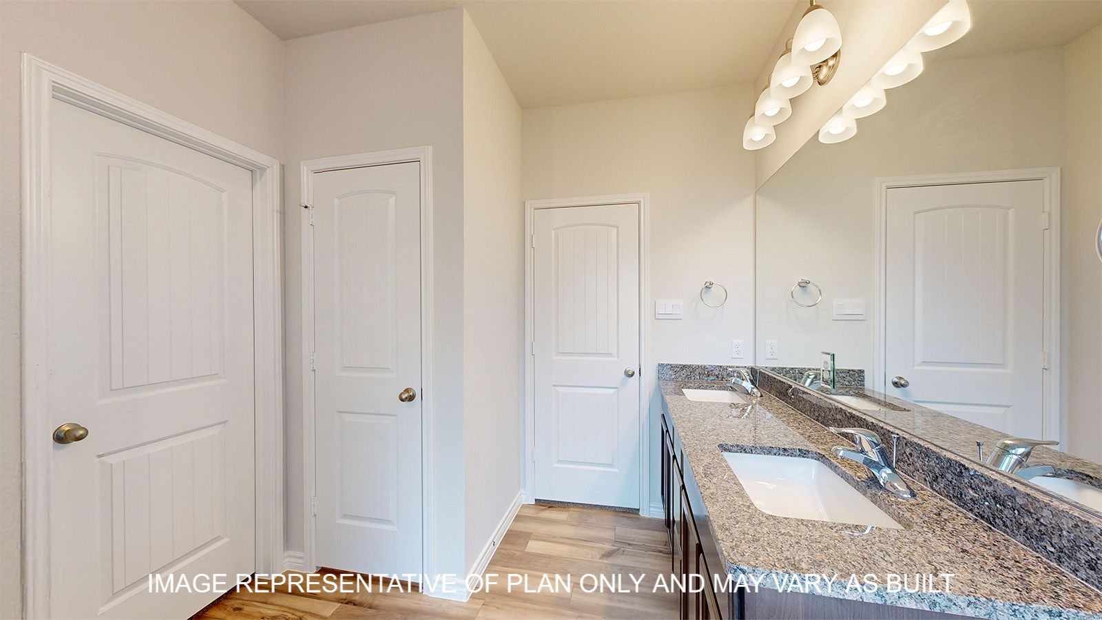 Everett primary bathroom with dark cabinet and granite countertops.