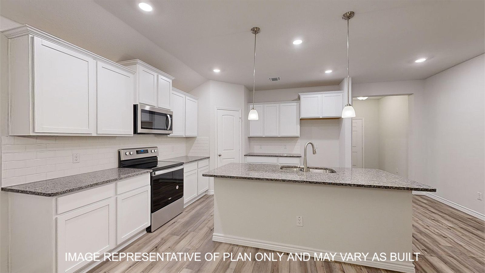 Everett kitchen with white cabinets and granite countertops.