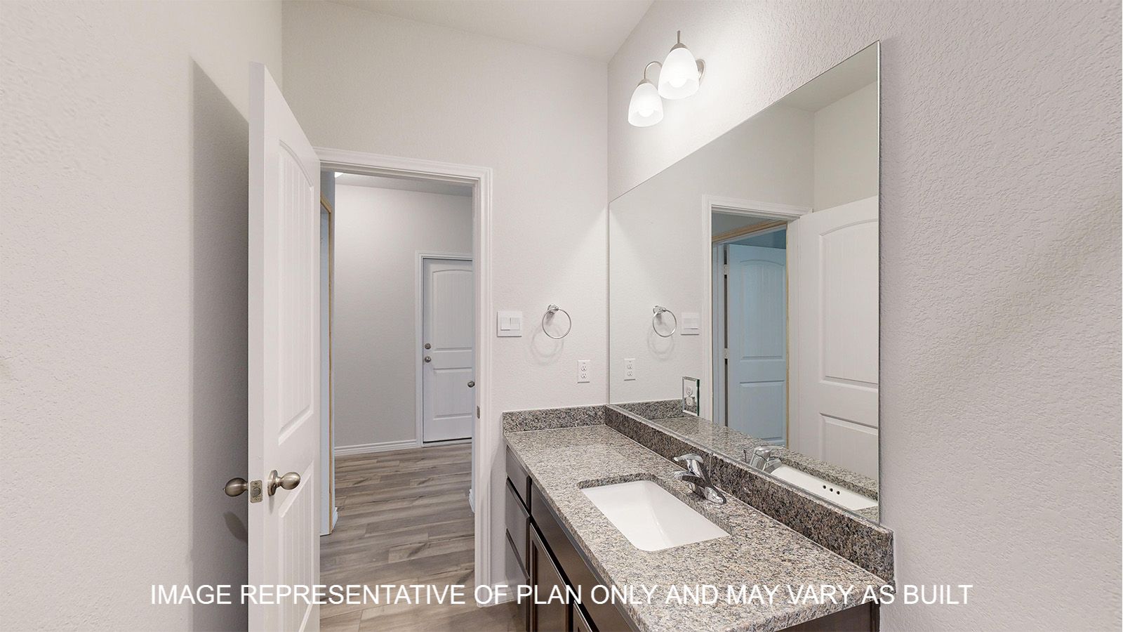 Magnolia third bath with single vanity and granite countertops.