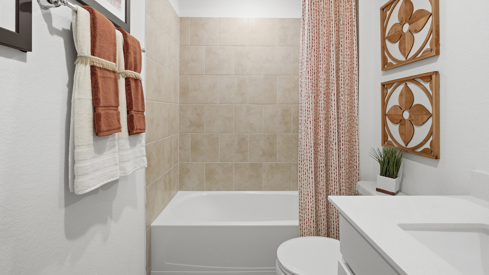 Ranch San Gabriel secondary bathroom with vanity sink and tub and shower combo.