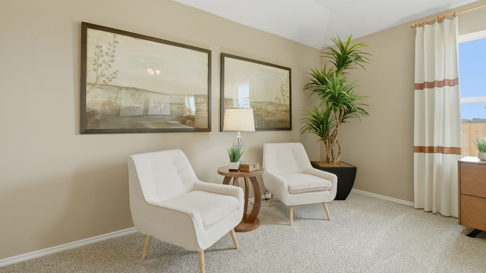 Ranch San Gabriel primary bedroom with carpeted flooring and windows for natural lighting.