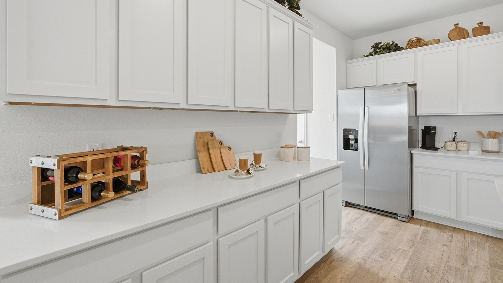 Ranch San Gabriel kitchen with white cabinets and granite countertops.