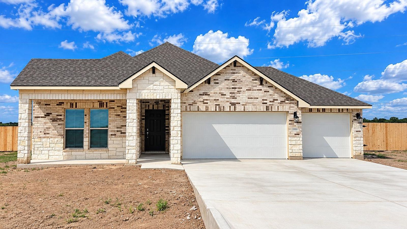 Monroe Front Exterior X Elevation with 3 car garage.
