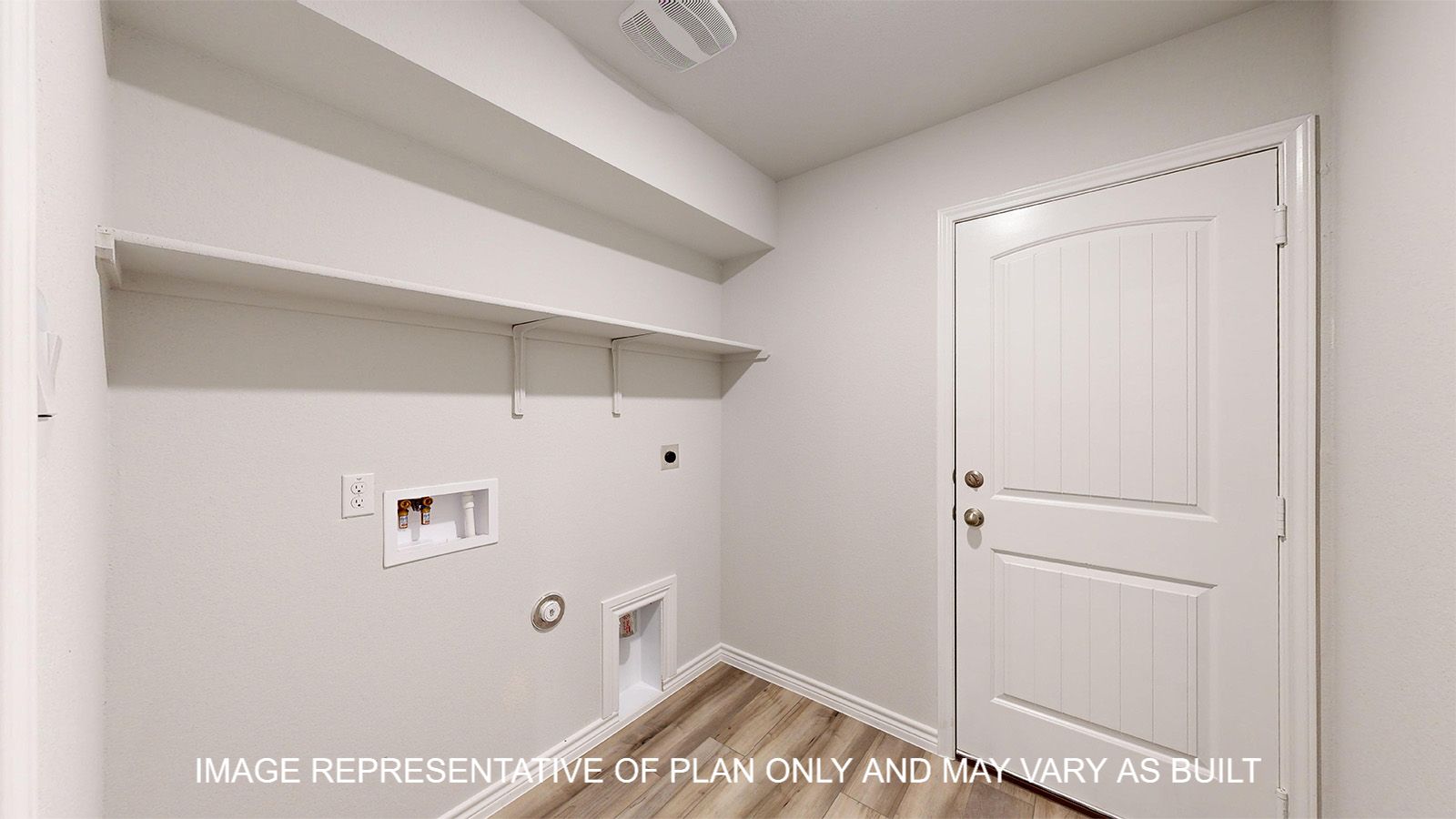Everett utility room with vinyl plank flooring and storage shelf.
