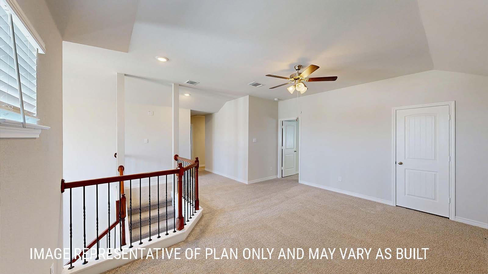Sonoma loft with carpeted flooring and view of stairs and secondary bedrooms.