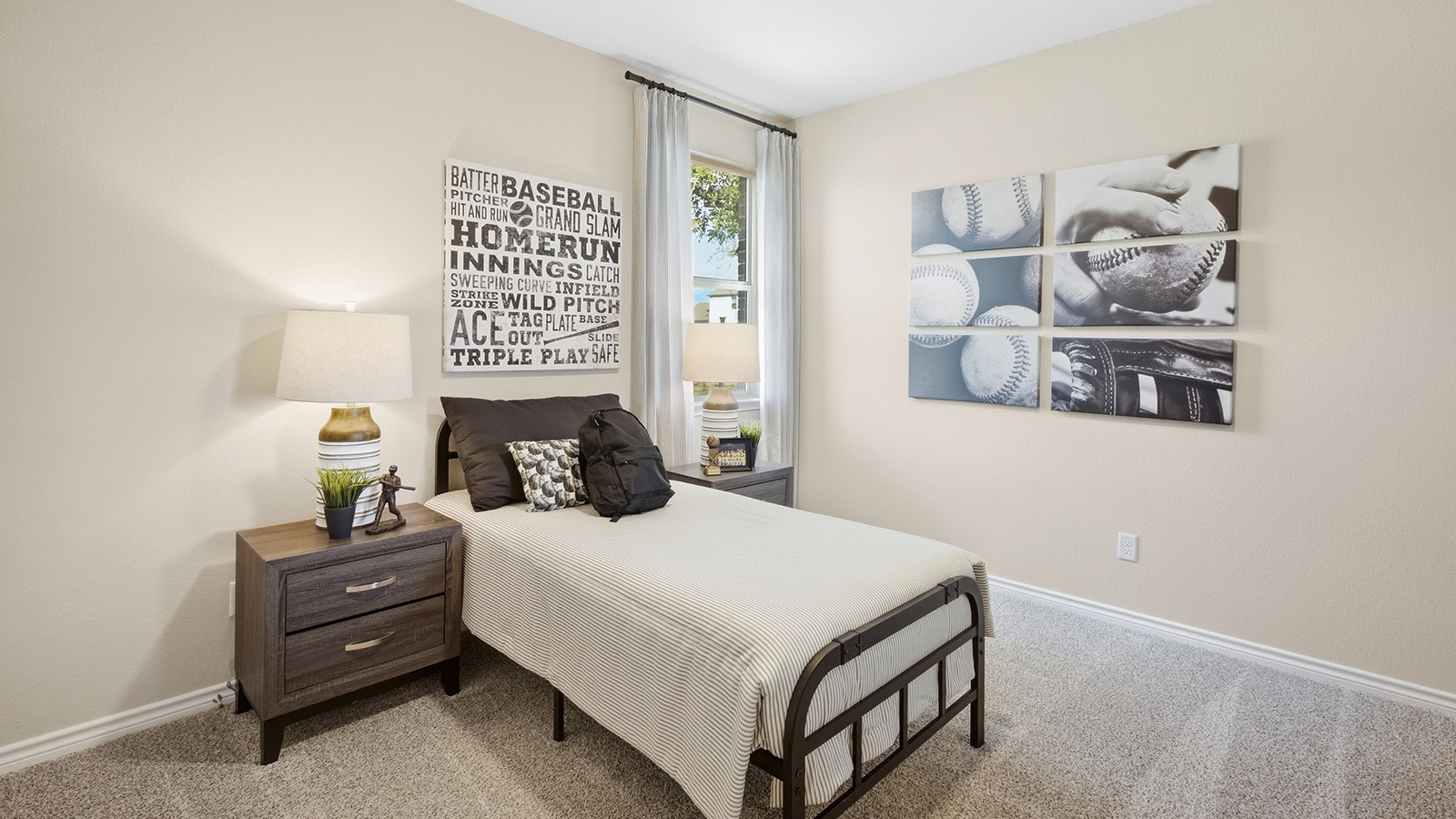 Homestead Model secondary bedroom with carpeted flooring and window for natural lighting.