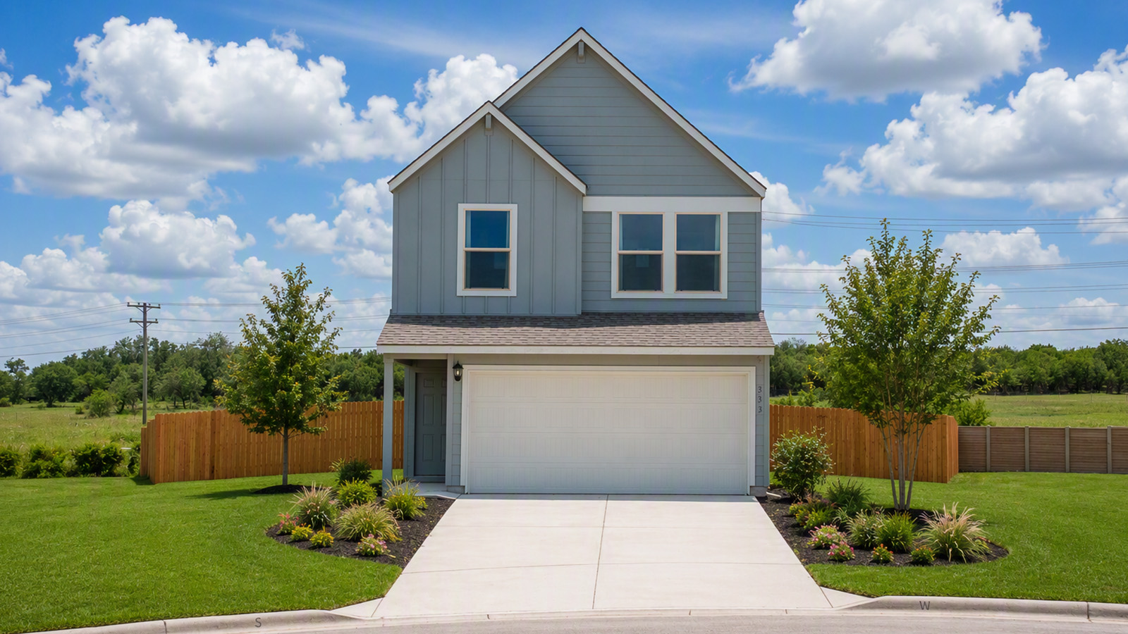 Cool Water model home front exterior view with landscape.