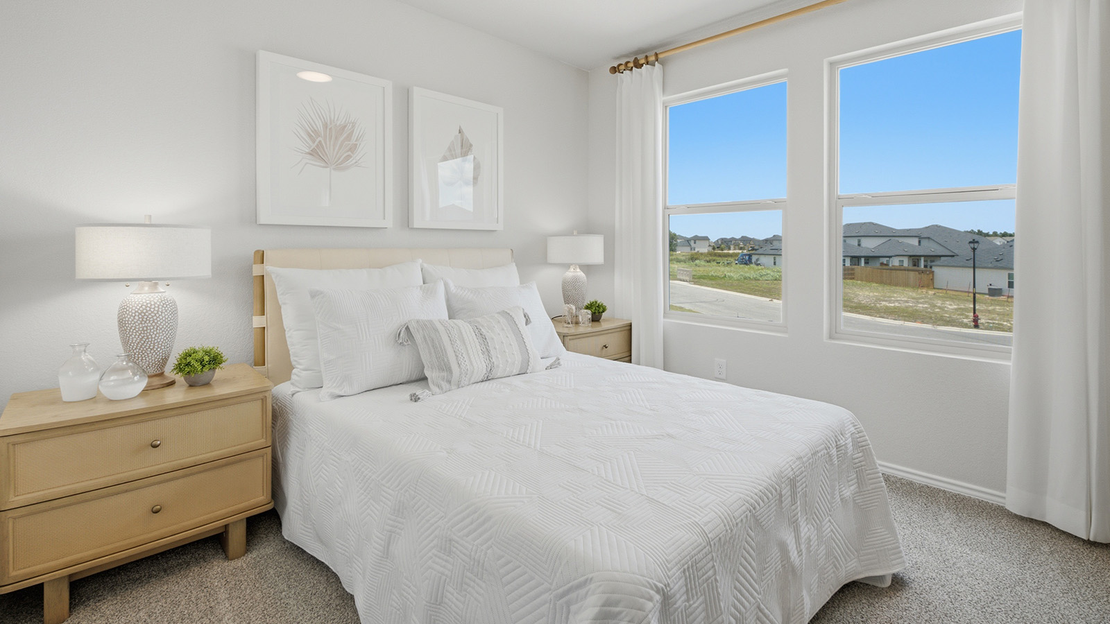 Cool Water model secondary bedroom with carpeted flooring and window for natural lighting.